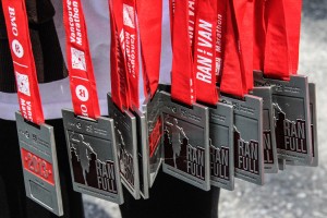 FINISH LINE – RUNNERS RECIEVE MEDALS –  FM – 2013 BMO–VANCOUVER MARATHON–VIMS– Photos by Ron Sombilon-37