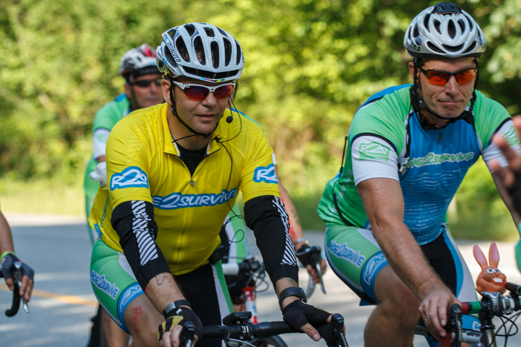 Kerry Kunzli, right, with cancer survivor Dennis Asbury, ride to raise funds for cancer research.